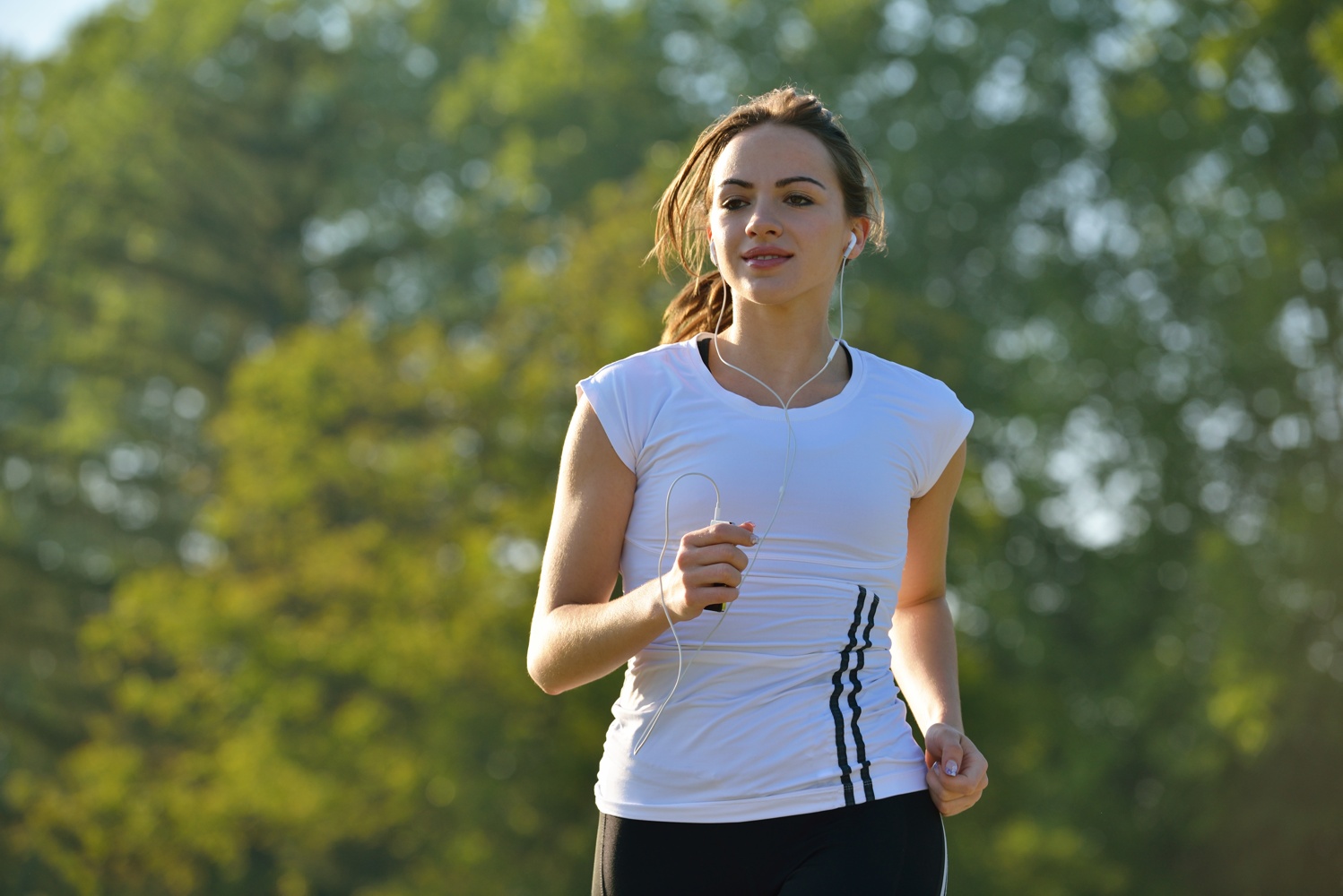 young-beautiful-woman-jogging-morning-park-woman-sport-outdoors-health-concept